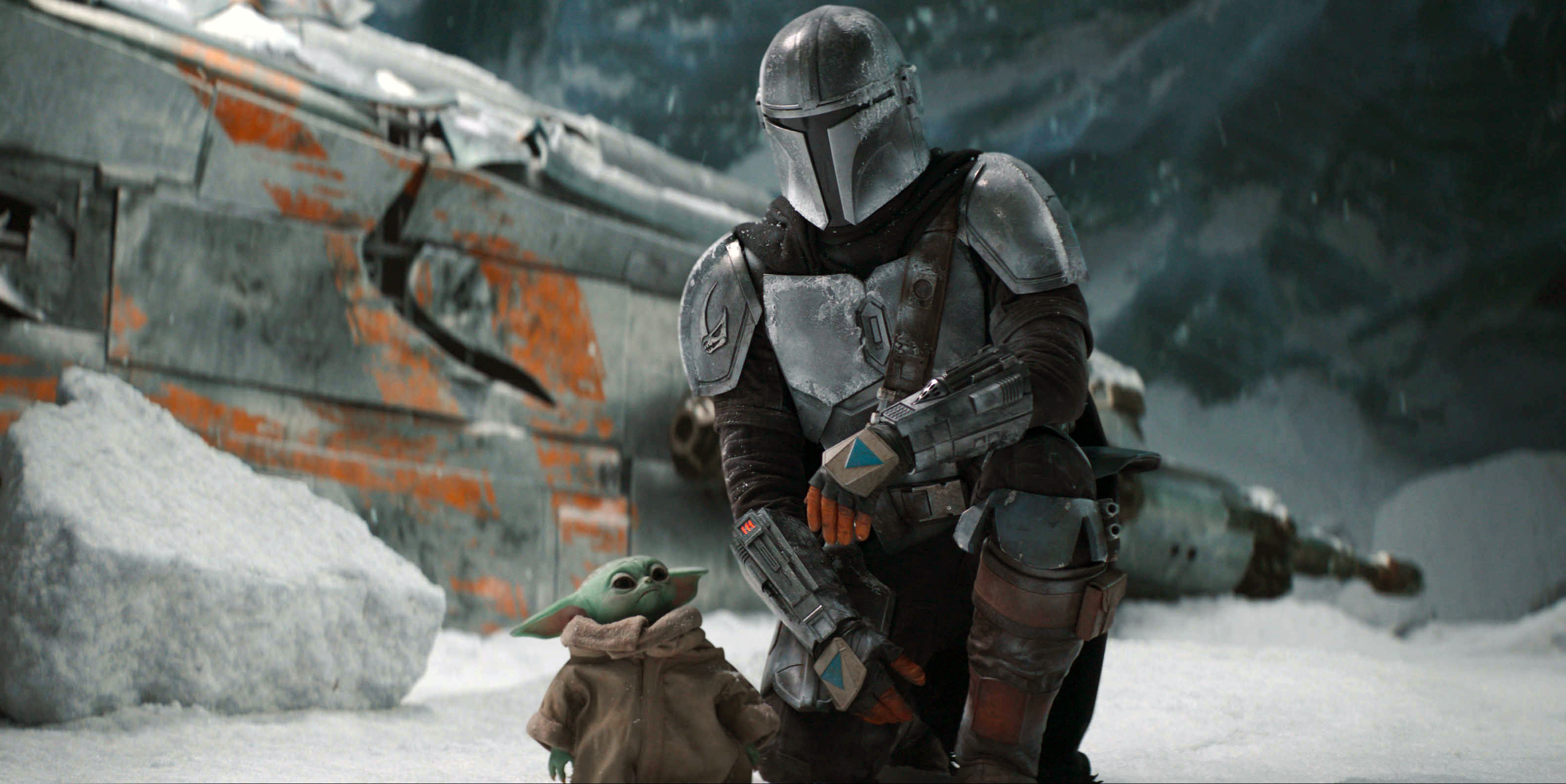 (Disney+ via AP)  Pedro Pascal, as Din Djarin, right, with The Child, in a scene from "The Mandalorian."