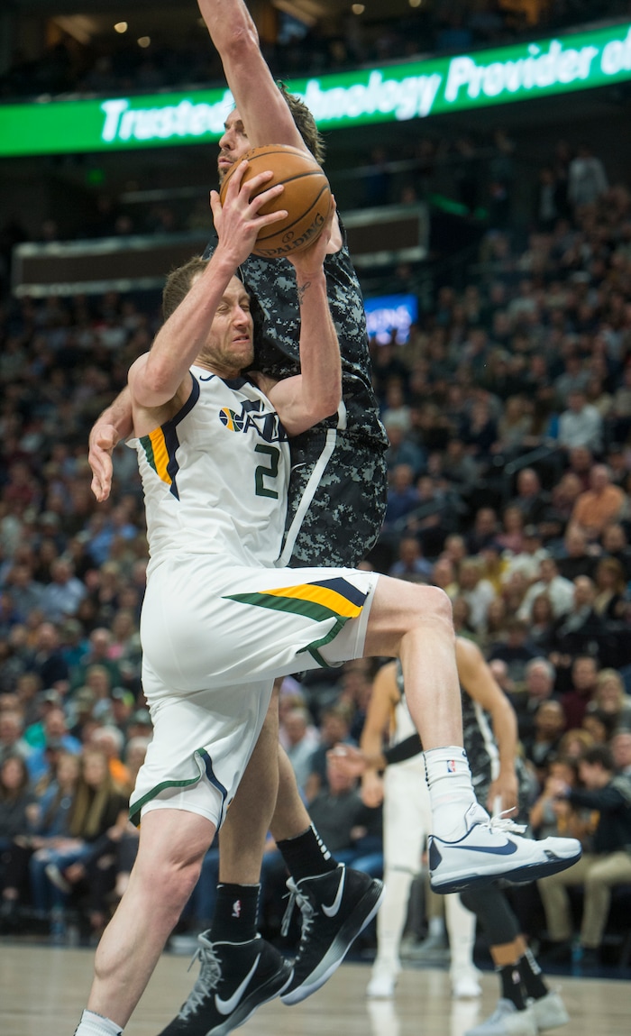 (Rick Egan  |  The Salt Lake Tribune)   San Antonio Spurs center Pau Gasol (16) stops Utah Jazz forward Joe Ingles (2) from scoring with a hard foul, in NBA action, in Salt Lake City, Monday, February 12, 2018.