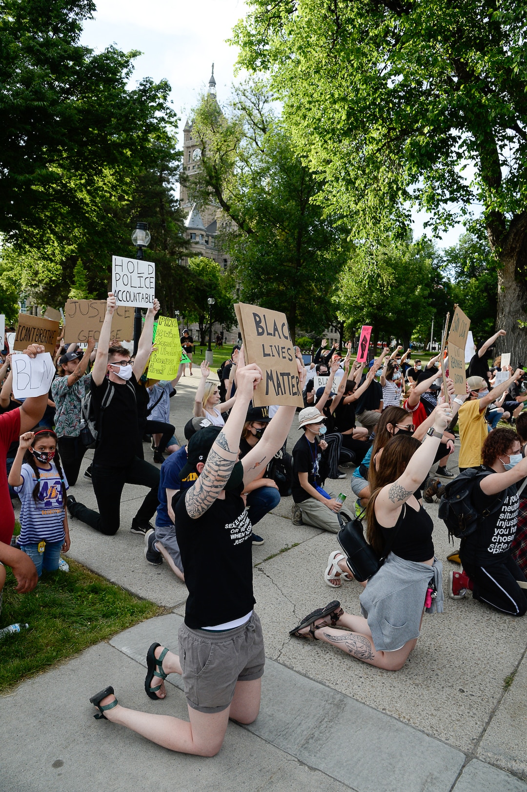 (Francisco Kjolseth  |  The Salt Lake Tribune) Demonstrators take a knee as they try and encourage law enforcement to do the same as they protest against police brutality on Tuesday, June 2, 2020, in downtown Salt Lake City, as an 8 p.m. weeklong curfew remains in order.
