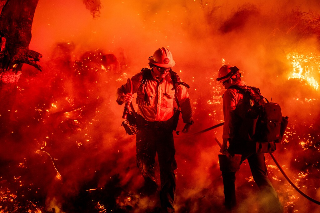 (Noah Berger | AP) Firefighter Giannis Giagos battles the Maria Fire in Santa Paula, Calif., on Friday, Nov. 1, 2019. According to Ventura County Fire Department, the blaze has scorched more than 8,000 acres and destroyed at least two structures.