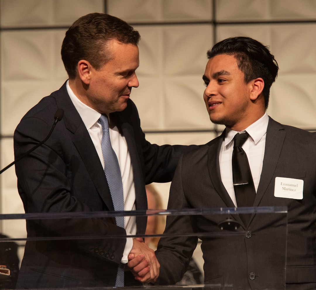 (Rick Egan  |  The Salt Lake Tribune)   Peter Huntsman Emmanual Martinez after presenting the the award to Education Award winner Julie Webb Townsend, from Roy High, at the Huntsman Awards for Excellence in Education at the Grand America Hotel, Friday,  April 26, 2019.