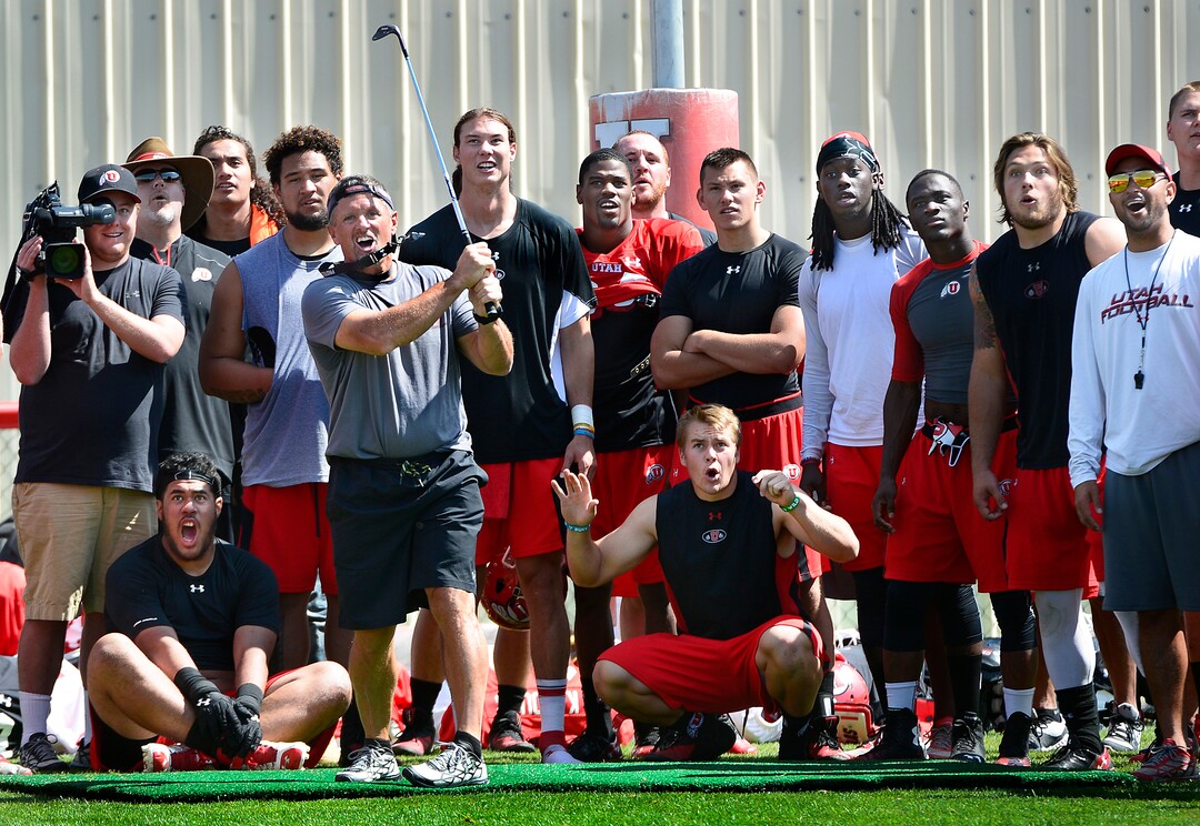 (Scott Sommerdorf | The Salt Lake Tribune) Kyle Whittingham follows through on a golf shot as the team held a golf competition after a football practice in 2014. 