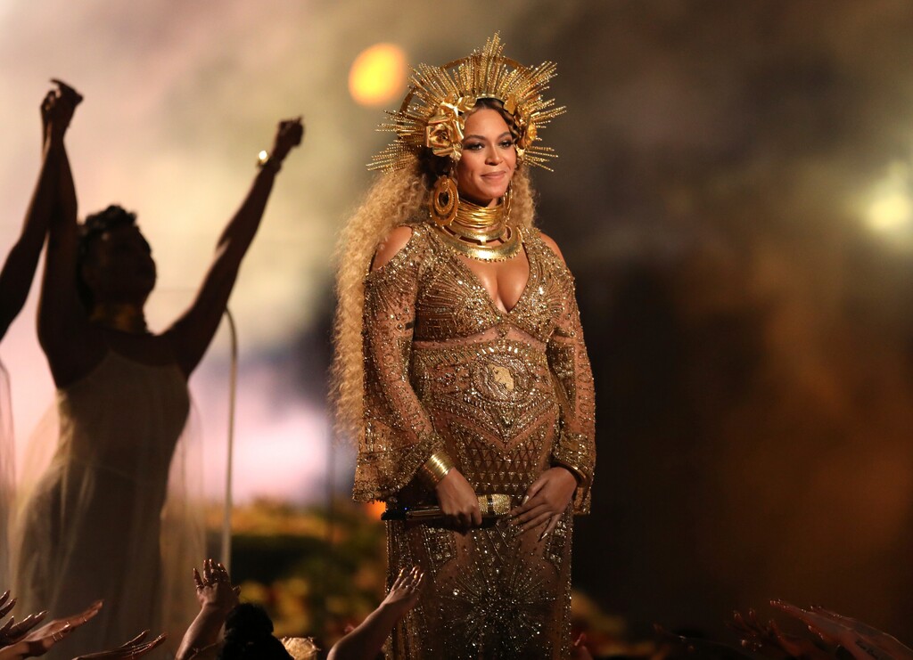 FILE - This Feb. 12, 2017, file photo shows Beyonce performing at the 59th annual Grammy Awards in Los Angeles. Beyonce debuted her newborn twins Sir Carter and Rumi in an Instagram post on July 13, 2017. (Photo by Matt Sayles/Invision/AP, File)