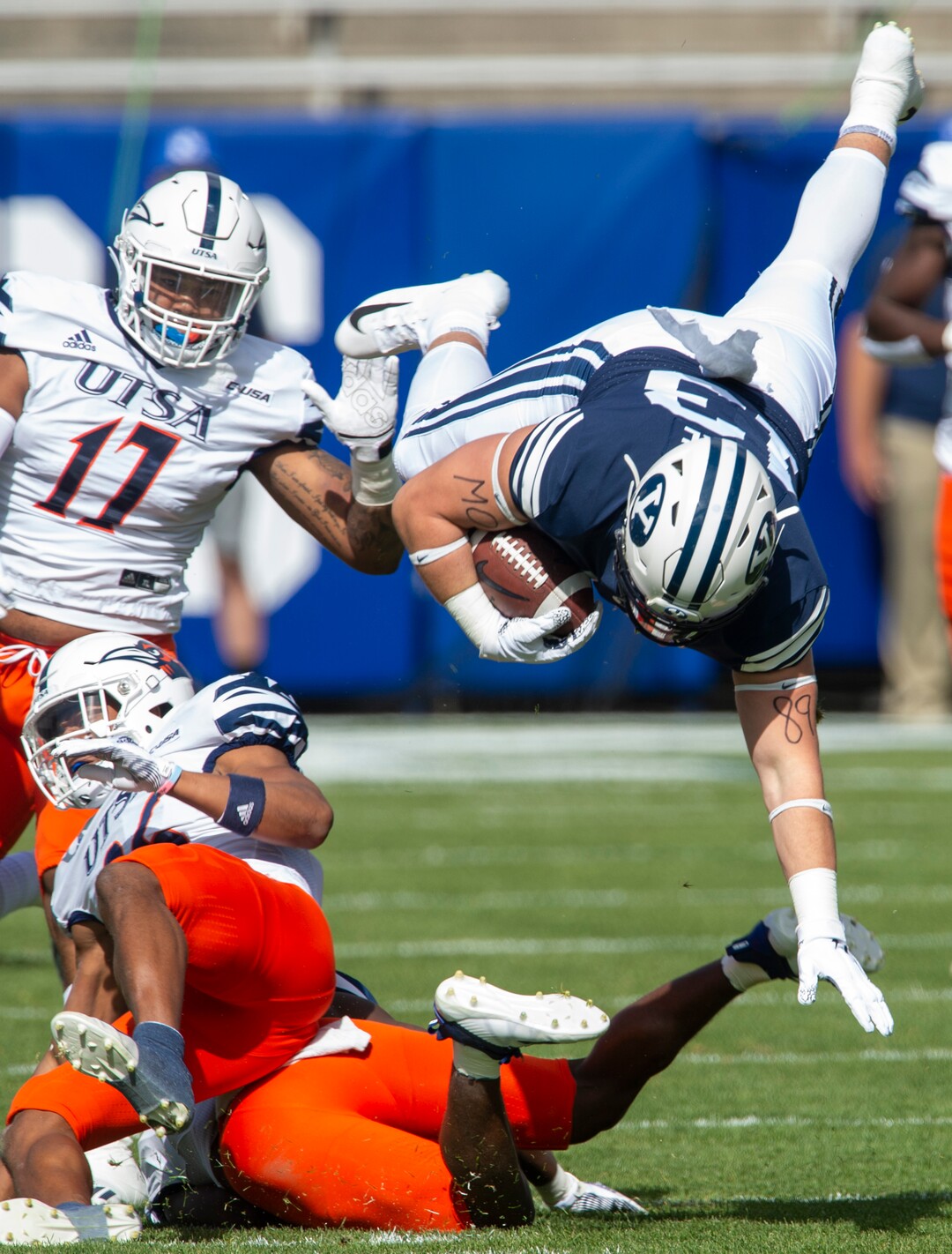 (Rick Egan  |  The Salt Lake Tribune)    Brigham Young Cougars tight end Masen Wake (13) leaps over the top of UTSA Roadrunners cornerback Corey Mayfield Jr. (26) in football action between the Brigham Young Cougars and the UTSA Roadrunners, at Lavell Edwards stadium, Saturday, Oct. 10, 2020.