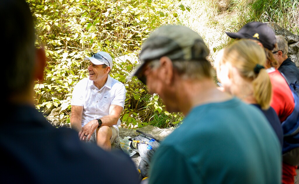 (Chris Samuels | The Salt Lake Tribune) U.S. Rep. John Curtis leads climate scientists and constituents on a hike in Rock Canyon in Provo on Monday.