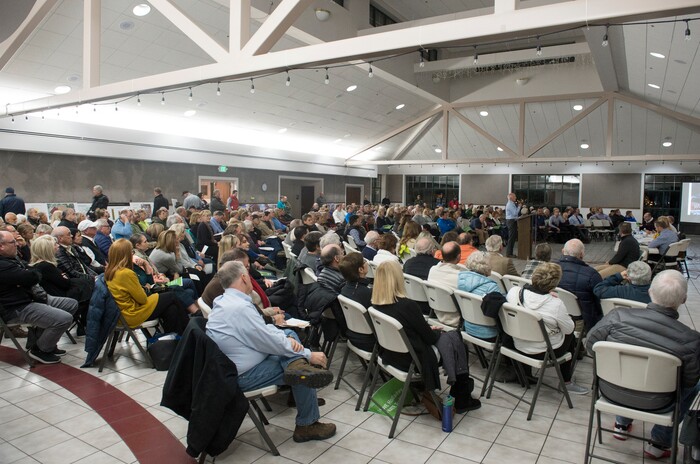 (Rick Egan  |  The Salt Lake Tribune)  Hundreds of concerned citizens gather at the St Vincent De Paul Catholic School for a public hearing about the developers plans for the old Cottonwood Mall site. Wednesday, December 13, 2017.


