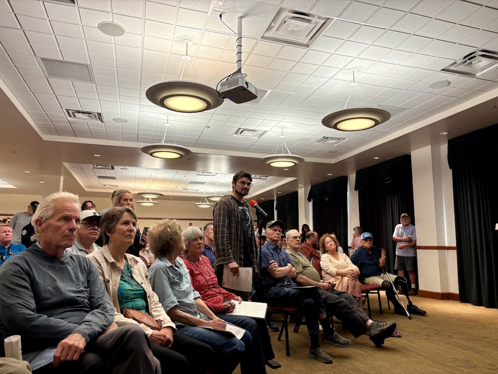 (Brooke Larsen | The Salt Lake Tribune) A resident raises concerns and questions about the proposed Red Butte energy campus and data center in Iron County during an open house in Cedar City on Thursday, May 14, 2026.