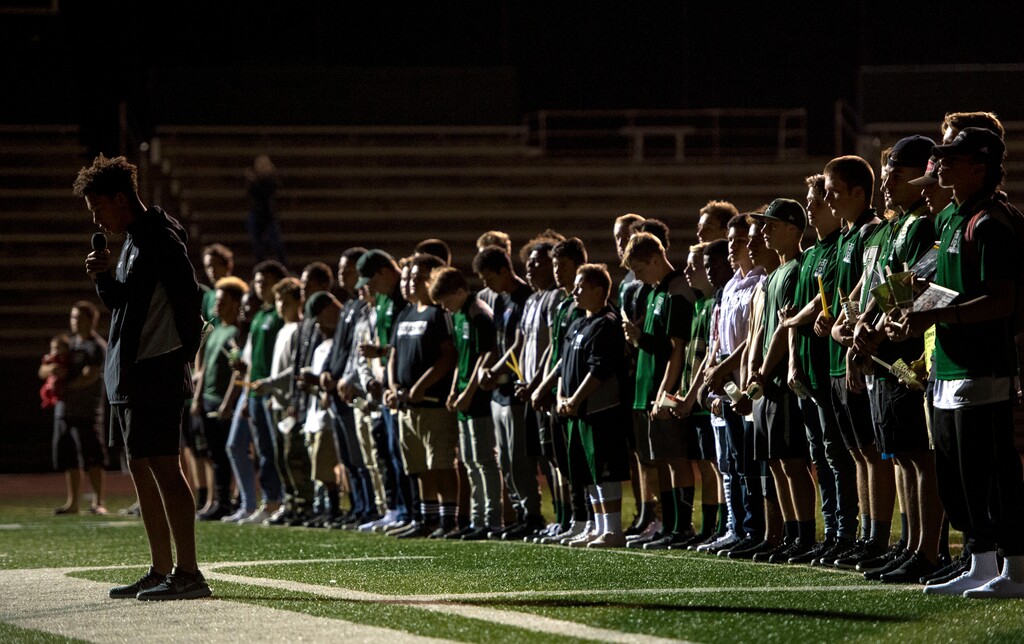 (Rick Egan  |  The Salt Lake Tribune)Bishop Brown, son of Cazzie Brown, says a few words at a candlelight vigil in honor of coach Cazzie Brown, at Hillcrest High School, Monday, August 28, 2017.