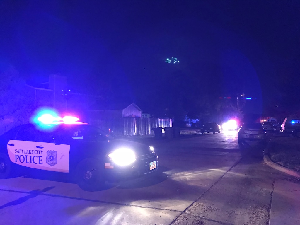 (Paighten Harkins | The Salt Lake Tribune) A Salt Lake City police car is parked near 800 N. Sir Patrick Dr., where an officer shot a person about 8 p.m. That person later died at the hospital.