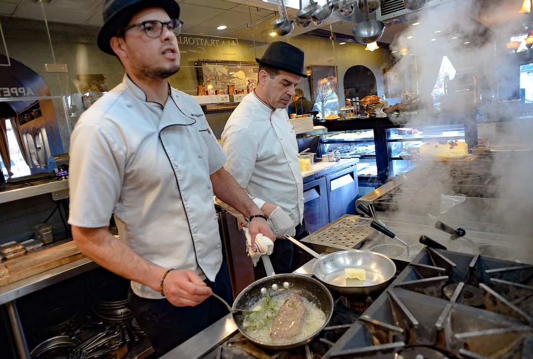 (Francisco Kjolseth  |  The Salt Lake Tribune) Martino Babio, left, and Francesco Mirenda prepare an order at La Trattoria di Francesco,  the newest Italian concept from the Sicilia Mia chain of restaurants.
