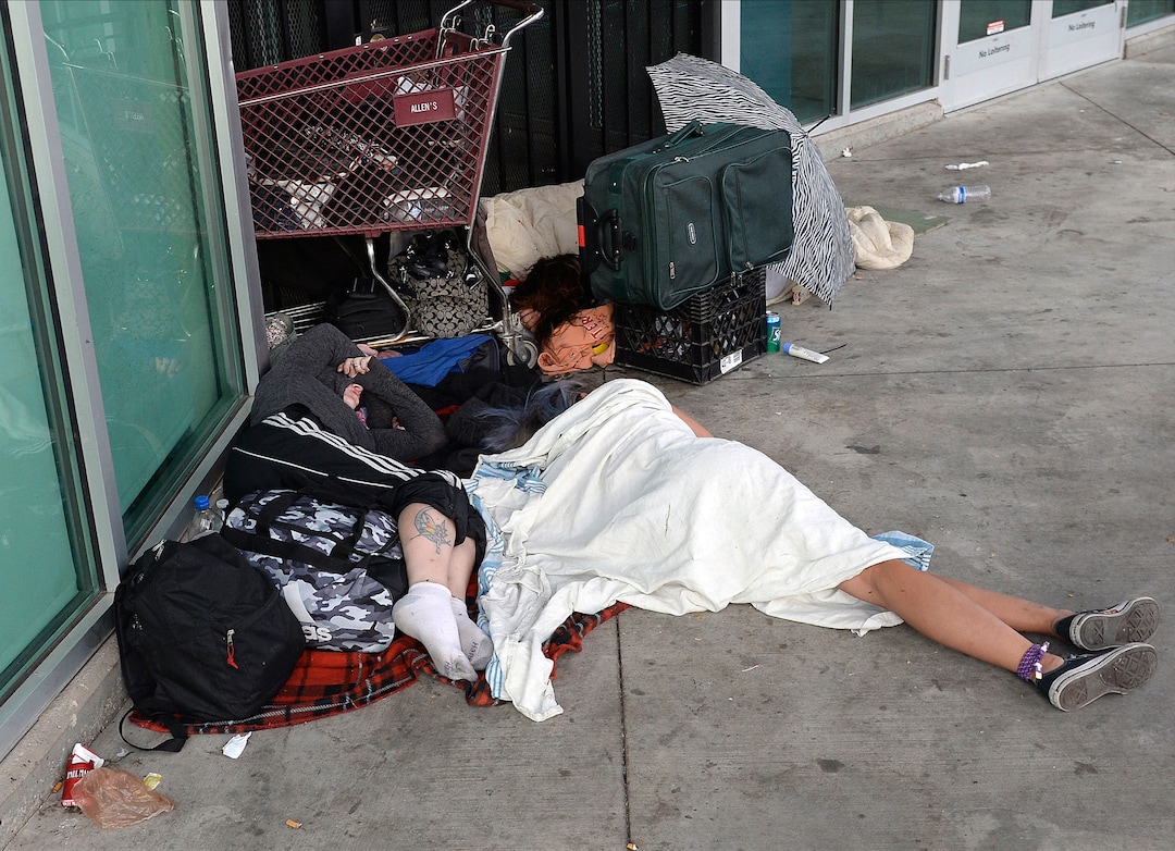 Al Hartmann  |  The Salt Lake TribuneTwo homeless women sleep along 200 S. and 500 West in Salt Lake City Wednesday July 19.  