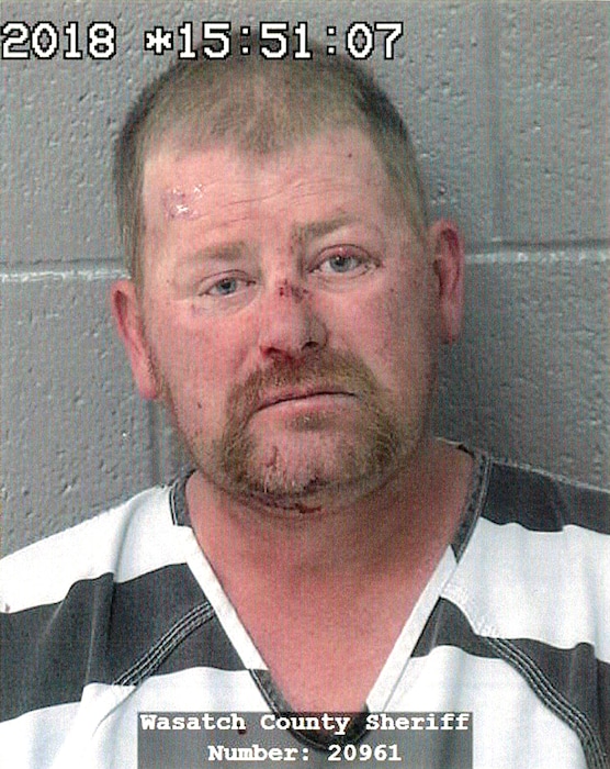 This Oct.2018, mug shot released by the Wasatch County Sheriff shows Jamie Don McKenzie, 41 in Heber City, Utah. (Wasatch County Sheriff via AP)