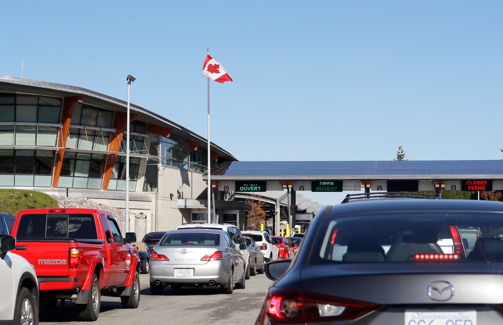 (Elaine Thompson | AP file photo) In this Oct. 9, 2019 photo, traffic enters Canada from the United States at the Peace Arch Border Crossing, in Blaine, Wash. The Washington state chapter of the Council on American-Islamic Relations says more than 60 Iranians and Iranian-Americans were detained and questioned at the border crossing over the weekend. A U.S. Customs and Border Protection spokesman, however, said no Iranian-Americans were detained or refused entry because of their country of origin.
