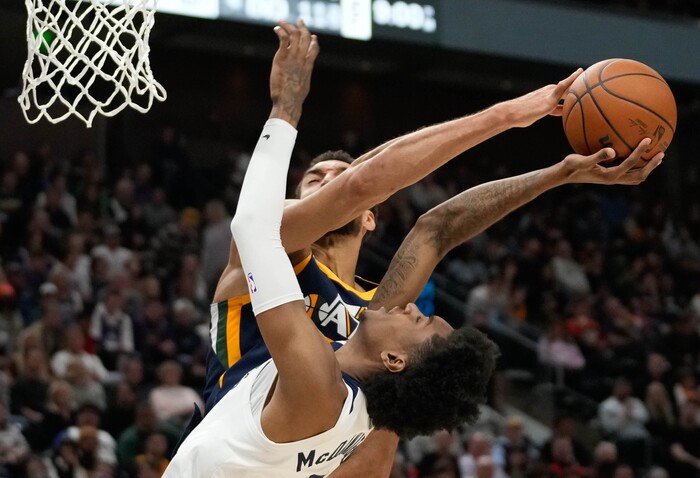 (Francisco Kjolseth | The Salt Lake Tribune) Utah Jazz center Rudy Gobert (27) shuts down Minnesota Timberwolves forward Jaden McDaniels (3) in NBA action between the Utah Jazz and the Minnesota Timberwolves at Vivint Smart Home Arena in Salt Lake City, Thursday, Dec. 23, 2021.