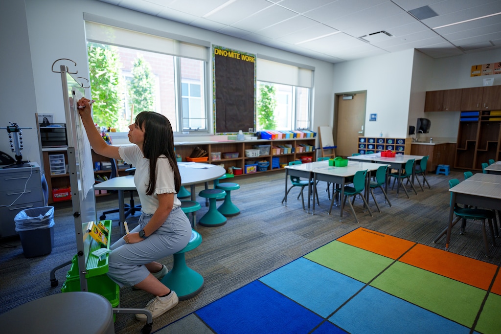 (Trent Nelson  |  The Salt Lake Tribune) Kindergarten teacher Kaitlin Roundy preps her room at Glacier Hills Elementary in Sandy on Thursday, Aug. 15, 2024.