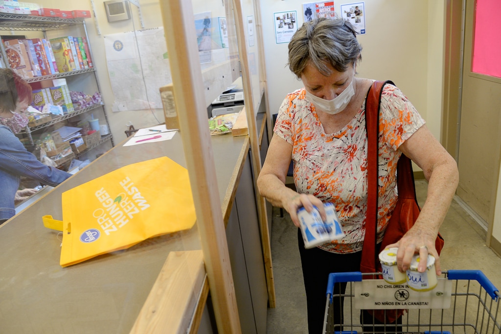 (Francisco Kjolseth  |  The Salt Lake Tribune) JoAnn Hagen visits the Taylorsville Food Pantry for the first time on Saturday, May 30, 2020. Hagen who has a day care has found herself tight on money after kids stopped coming when the coronavirus pandemic hit. Census reports a third of Utahns say they are not getting enough to eat during the pandemic.