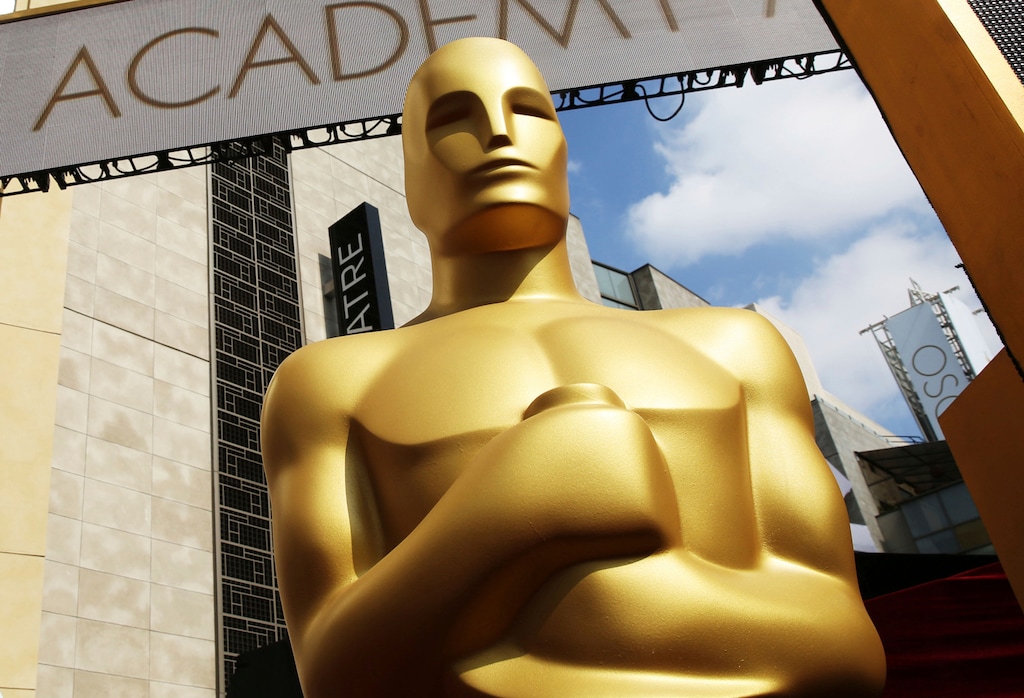 (Matt Sayles  |  AP file photo) A giant replica of an Oscar statuette outside the Dolby Theatre in Los Angeles. The 93rd Academy Awards will happen Sunday, April 25, from the Dolby Theatre and Union Station in Los Angeles — thus allowing a socially distanced group of nominees and presenters on Hollywood's biggest night, in spite of the COVID-19 pandemic.