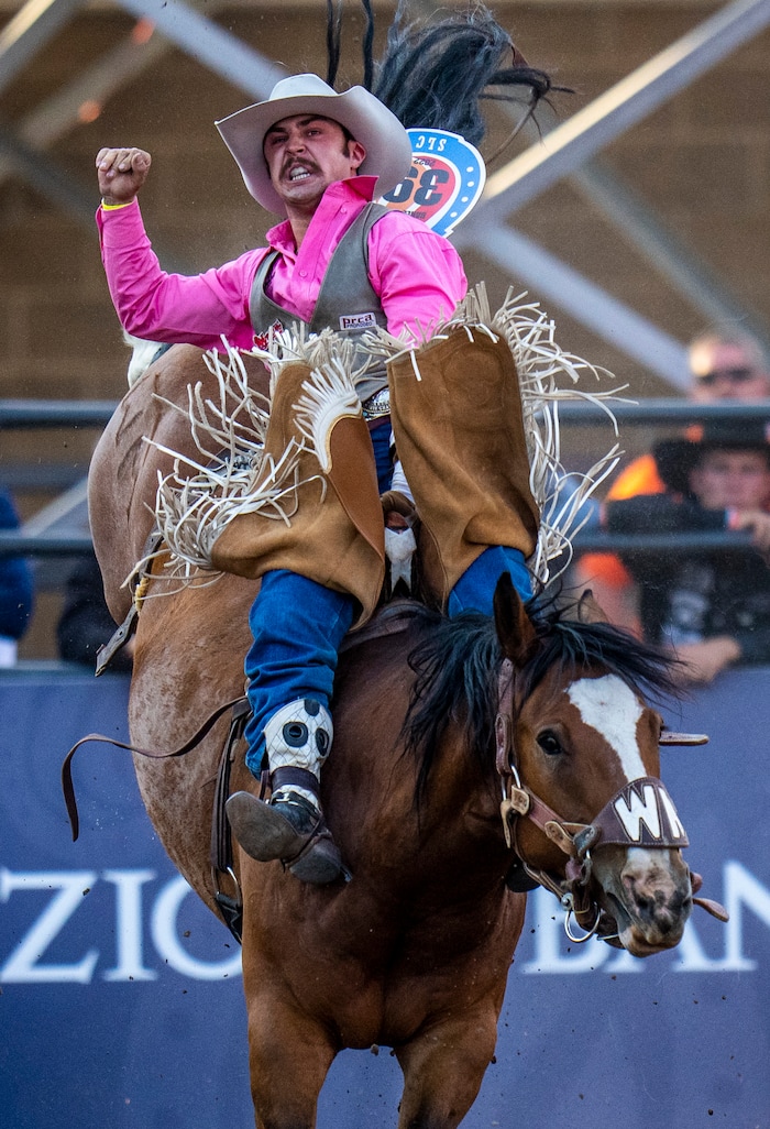 (Rick Egan | The Salt Lake Tribune) Donny Profit, from Diamondville, Wyo., competes in the bareback riding competition at the Utah Days of '47 Rodeo at the State Fairpark, on Monday, July 25, 2022.