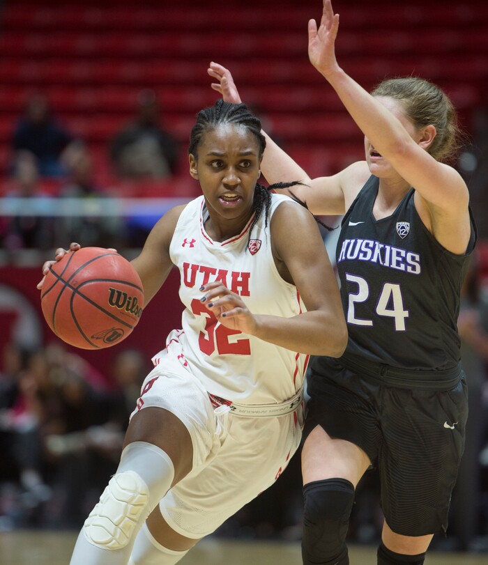 (Rick Egan  |  The Salt Lake Tribune)      Utah Utes forward Tanaeya Boclair (32) dribbles past Washington Huskies guard Jenna Moser (24), in PAC-12 women's basketball action at the Jon M. Huntsman Center, Sunday, Feb. 18, 2018.