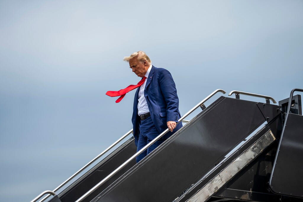 (Doug Mills | The New York Times) Former President Donald Trump, a candidate for the Republican presidential nomination, arrives at Reagan National Airport in Washington en route to his arraignment in federal court on Thursday, Aug. 3, 2023.