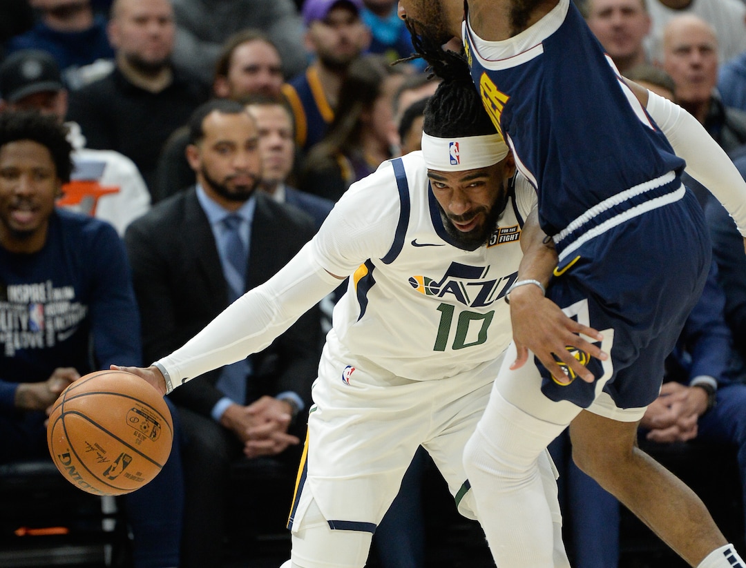(Francisco Kjolseth  |  The Salt Lake Tribune) Utah Jazz guard Mike Conley (10) finds himself in a tight spot as the Utah Jazz host the Denver Nuggets in their NBA basketball game at Vivint Smart Home Arena in Salt Lake City on Wednesday, Feb. 5, 2020.