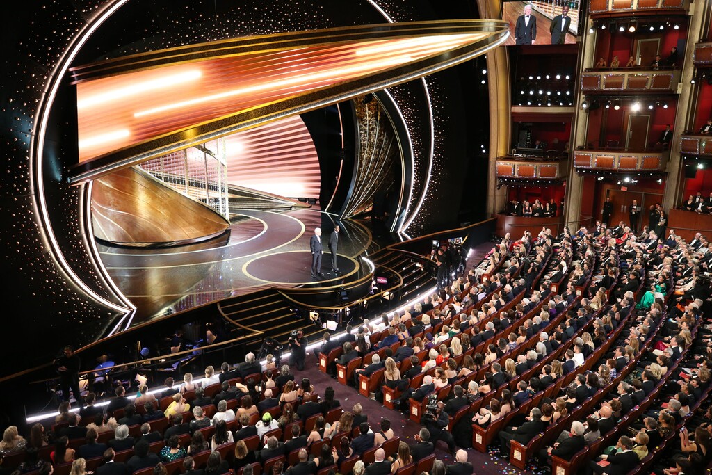 (Noel West | The New York Times) Steve Martin and Chris Rock during the 92nd annual Academy Awards at the Dolby Theater in Los Angeles, Feb. 9, 2020.  The Academy of Motion Picture Arts and Sciences said on Monday, June 15, that it would push back the next Oscars ceremony to April 25 from Feb. 28, citing the coronavirus pandemic.