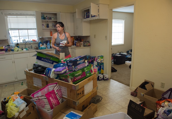 (Rachel Molenda  |  The Salt Lake Tribune)  Amie Coble organizes items for residents impacted by Hurricane Harvey in Lumberton, Texas, on Tuesday, Sept. 5, 2017. Gateway church is using its property as a distribution center.
