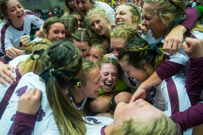 (Chris Detrick  |  The Salt Lake Tribune)  Members of the Morgan Trojans celebrate after winning the 3A volleyball state championships at the UCCU Center at Utah Valley University Thursday, October 26, 2017.  Morgan defeated North Sanpete 3-0.