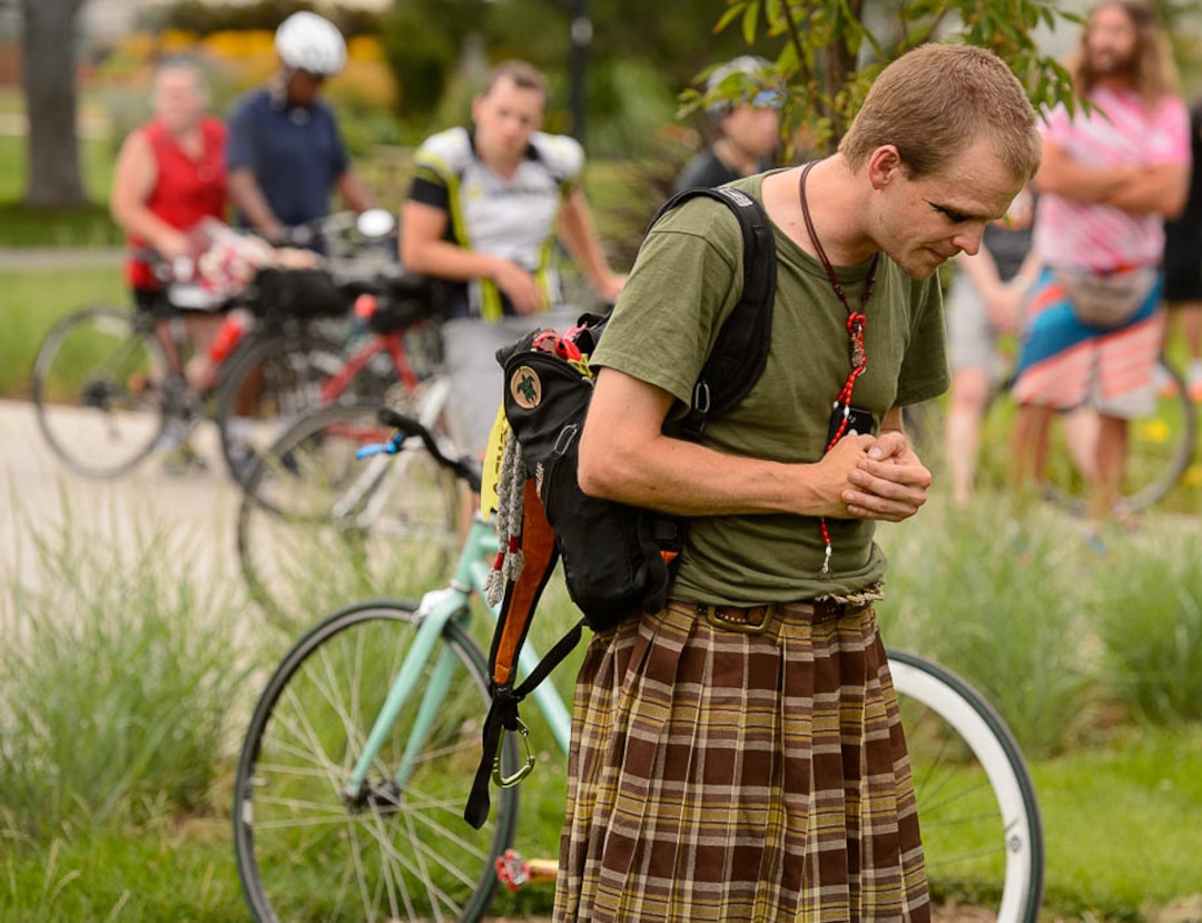(Trent Nelson | The Salt Lake Tribune)Cyclists gather and ride around Salt Lake City's Liberty Park, Saturday July 21, 2018, in remembrance of Cameron Hooyer, a rider who was killed by a FrontRunner train during a 999 Ride on Thursday. Zed Sonder offers a prayer before the ride.
