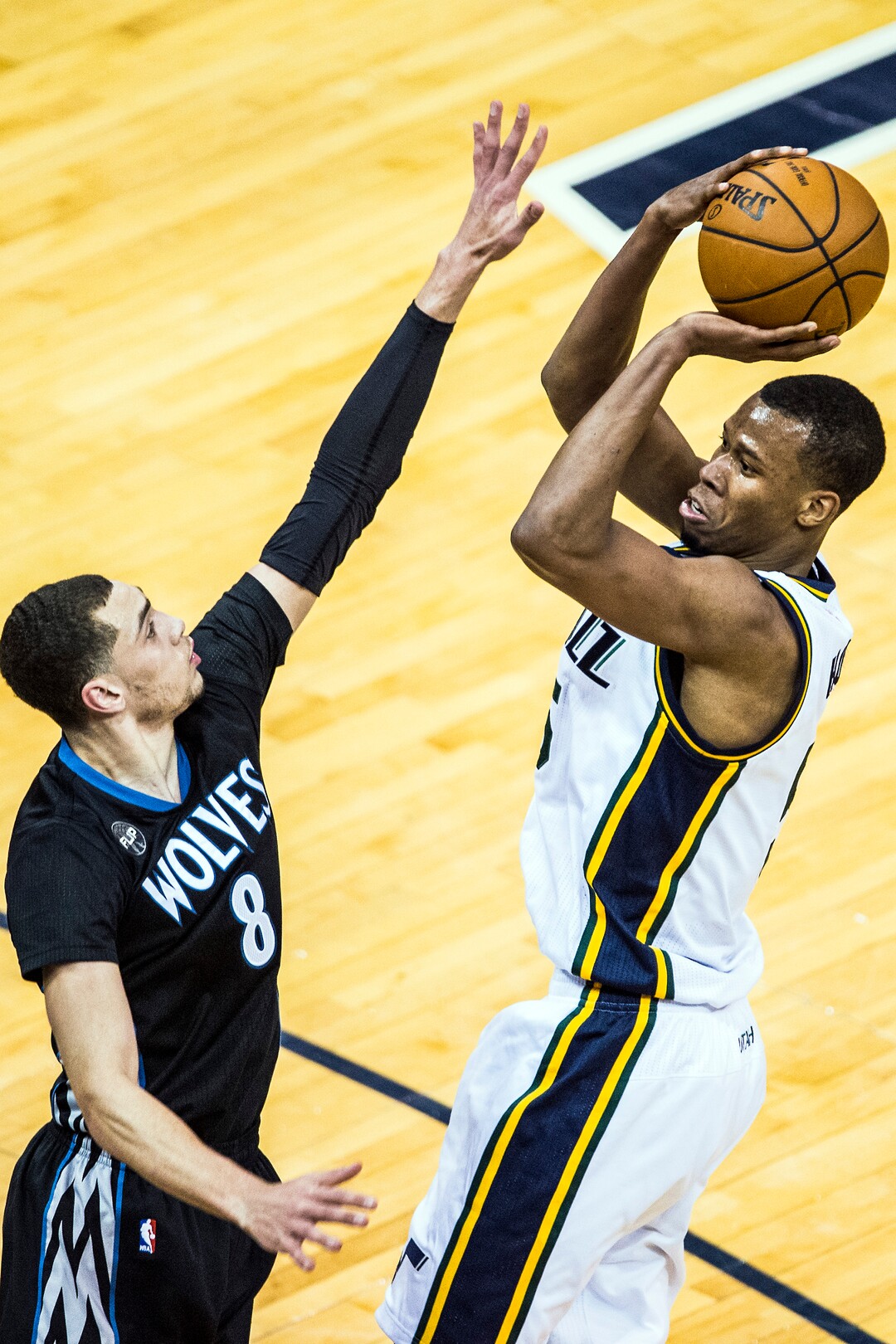 Chris Detrick  |  The Salt Lake TribuneUtah Jazz guard Rodney Hood (5) shoots past Minnesota Timberwolves guard Zach LaVine (8) during the game at Vivint Smart Home Arena Friday January 29, 2016. Utah Jazz defeated the Minnesota Timberwolves 103-90.
