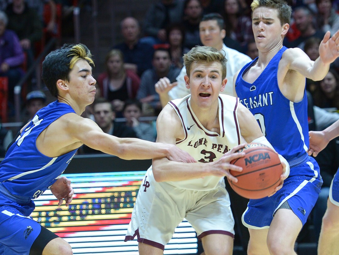 (Leah Hogsten  |  The Salt Lake Tribune) Pleasant Grove's Kawika Akina (21) fouls out against Lone Peak's Steven Ashworth (03) on the play and leaves the game. Lone Peak defeated Pleasant Grove 61-44 to win the 6A High School Boys’ Basketball Tournament Championship at the Jon M. Huntsman Center in Salt Lake City, Saturday, March 3, 2018. 
