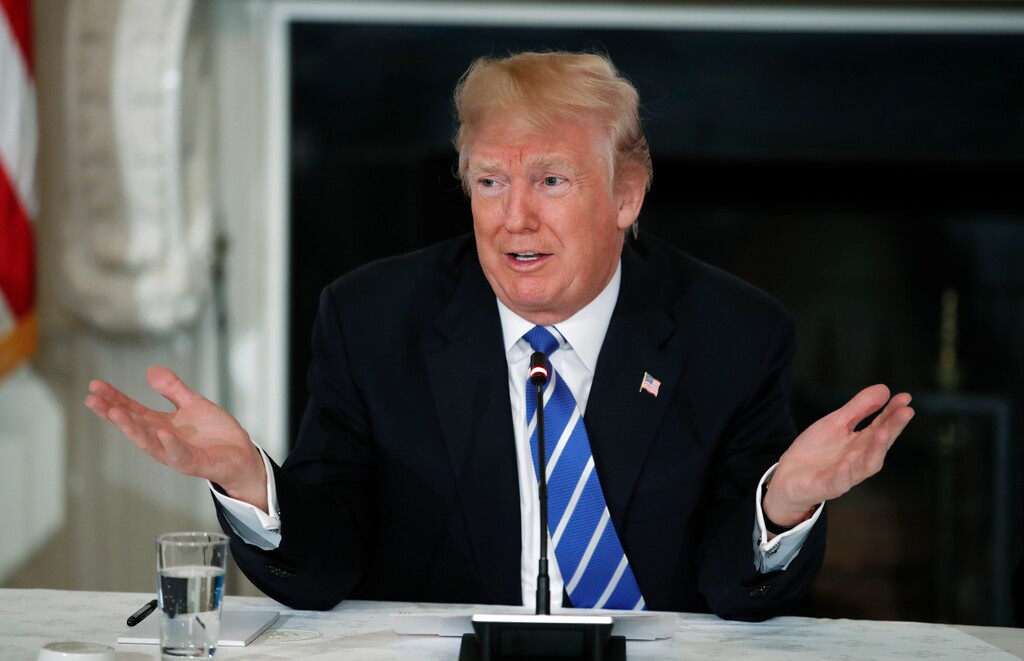 President Donald Trump speaks in the State Dining Room of the White House in Washington, Monday, Feb. 12, 2018, during a meeting with state and local officials about infrastructure. (AP Photo/Carolyn Kaster)