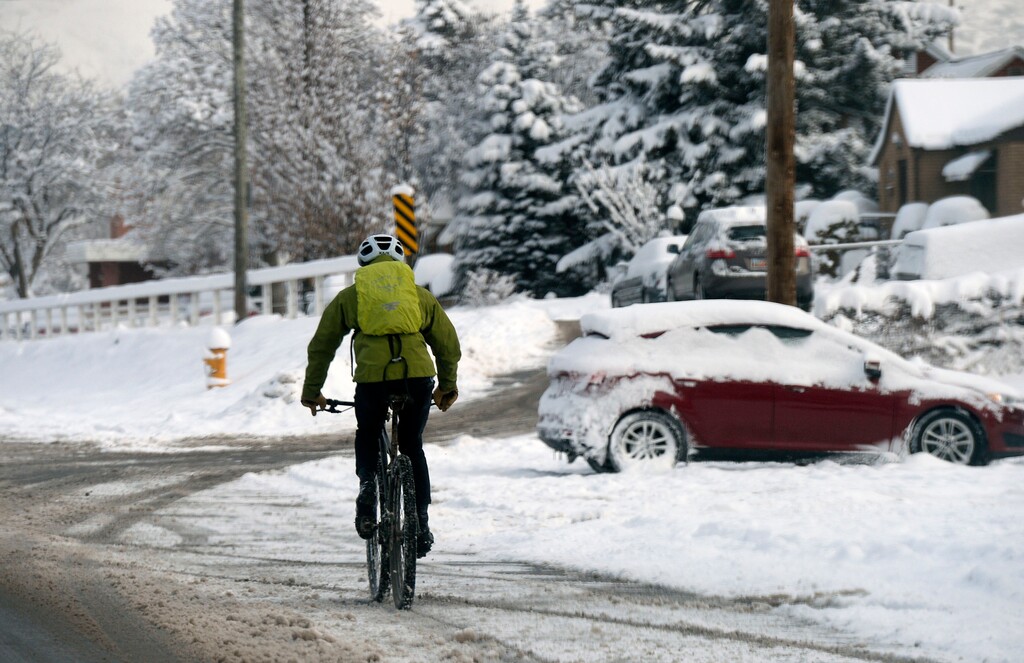 (Al Hartmann  |  The Salt Lake Tribune) 	
A bicyclist takes a snowy commute Tuesday morning Feb. 20, 2018, in Salt Lake City. The first major storm of the season should help the snowpack in the mountains.
