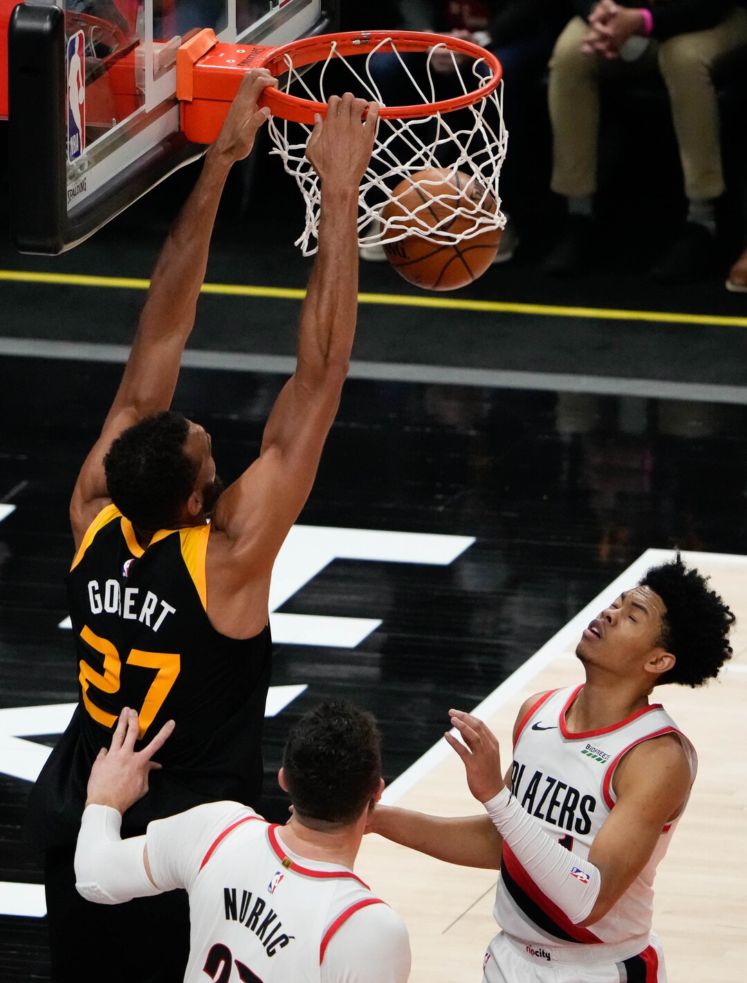 (Francisco Kjolseth | The Salt Lake Tribune) Utah Jazz center Rudy Gobert (27) goes in for the dunk in NBA action between the Utah Jazz and the Portland Trail Blazers, at Vivint Smart Home Arena, on Wednesday, May 12, 2021.
