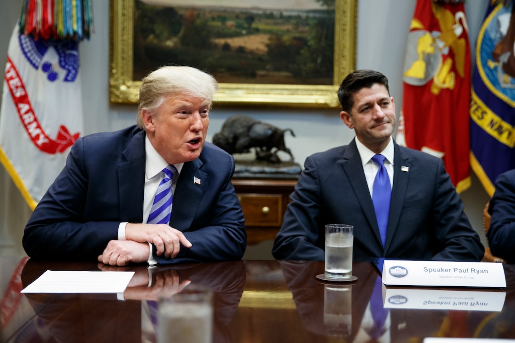 (Evan Vucci | AP file photo) Former Speaker of the House Rep. Paul Ryan, R-Wis., listens to President Donald Trump speak during a meeting with Republican lawmakers in the Roosevelt Room of the White House in Washington on September 2018.