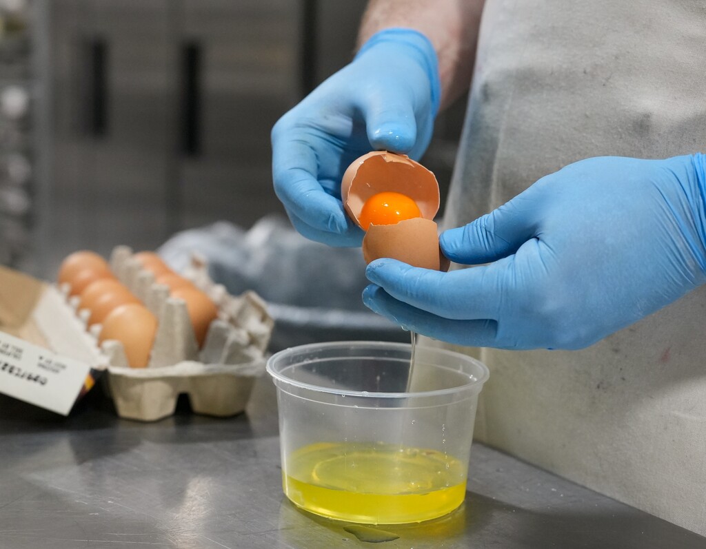 (Chris Samuels | The Salt Lake Tribune) Pastry chef Mike Woods separates eggs to prep for making macarons at Fillings and Emulsions in Salt Lake City, Thursday, Feb. 13, 2025.