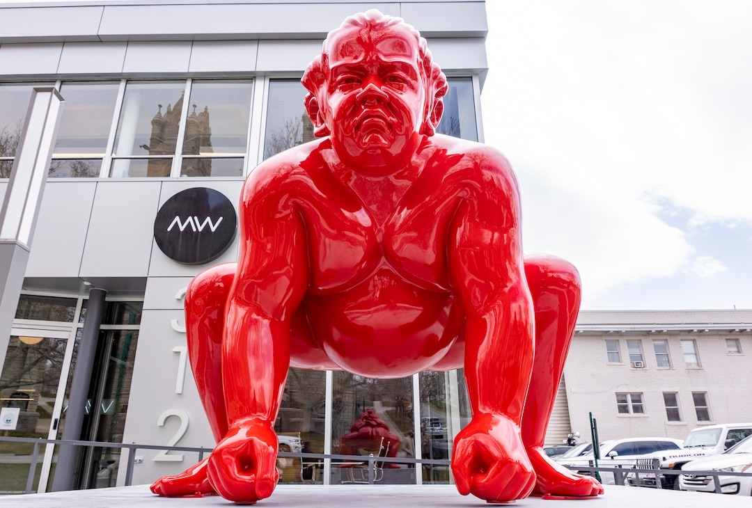 (Rick Egan | The Salt Lake Tribune)  A new art installation of a life-size sumo wrestler, in front of the Mountain West Commercial Real Estate building, previously the KALL Radio 910 broadcast station, on South Temple, in Salt Lake City, on Monday, March 29, 2021