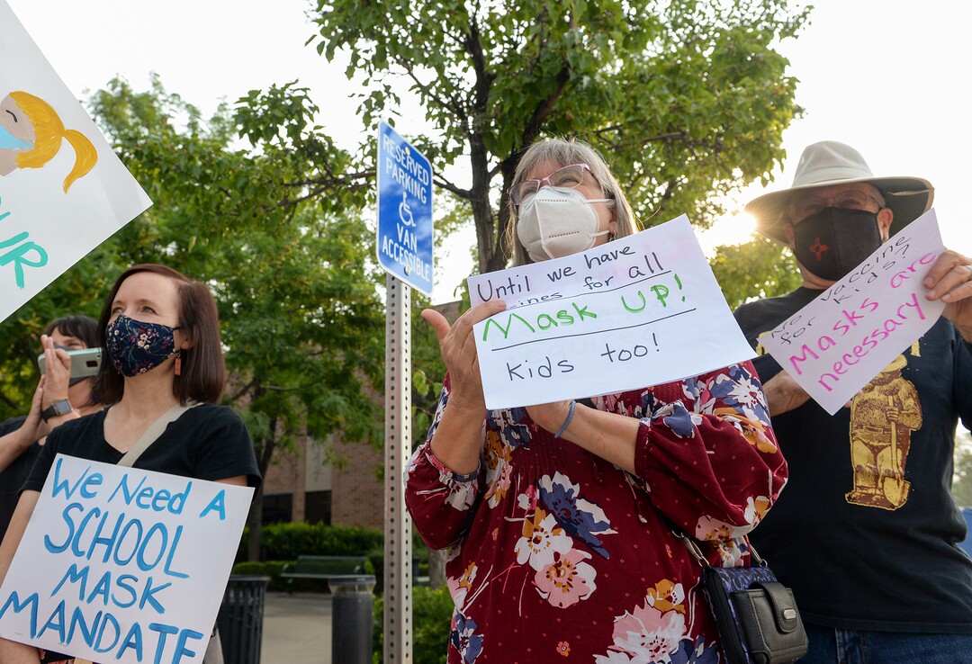(Chris Samuels | The Salt Lake Tribune) People participate at a rally advocating mask use in schools outside the Utah Board of Education building, Friday, Aug. 6, 2021.