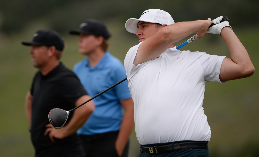 (Francisco Kjolseth  |  The Salt Lake Tribune)  Chase Lansford, right, drives the ball as he competes in the State Amateur golf championship at Soldier Hollow Golf Course on Saturday, July 13, 2019. Preston Summerhays, in background, joined by his father Boyd, went on to win 7 and 6 in the final championship match.