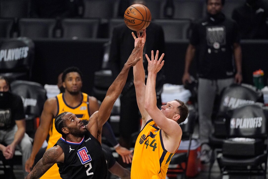 Utah Jazz forward Bojan Bogdanovic, right, shoots as Los Angeles Clippers forward Kawhi Leonard defends during the first half in Game 4 of a second-round NBA basketball playoff series Monday, June 14, 2021, in Los Angeles. (AP Photo/Mark J. Terrill)