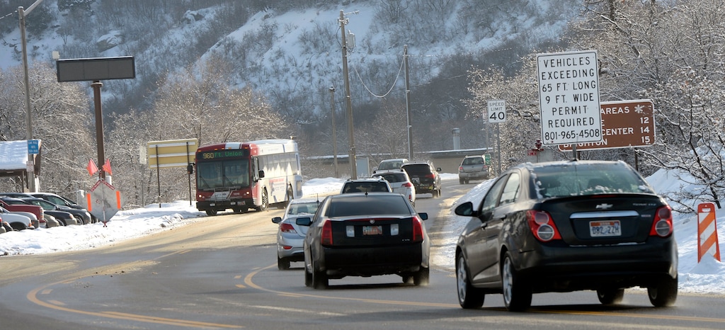 (Al Hartmann | Tribune file photo) Busy ski traffic at the mouth of Big Cottonwood on Feb. 5, 2016. Officials warn they will close uphill traffic in Big and Little Cottonwood canyons this year when traffic is full. They say the canyons have become especially popular during the pandemic.