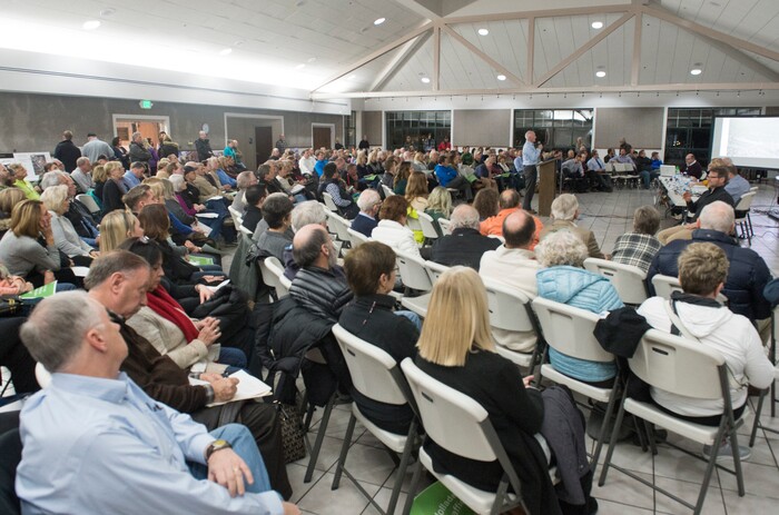 (Rick Egan  |  The Salt Lake Tribune)  Hundreds of concerned citizens gather at the St Vincent De Paul Catholic School for a public hearing about the developers plans for the old Cottonwood Mall site. Wednesday, December 13, 2017.


