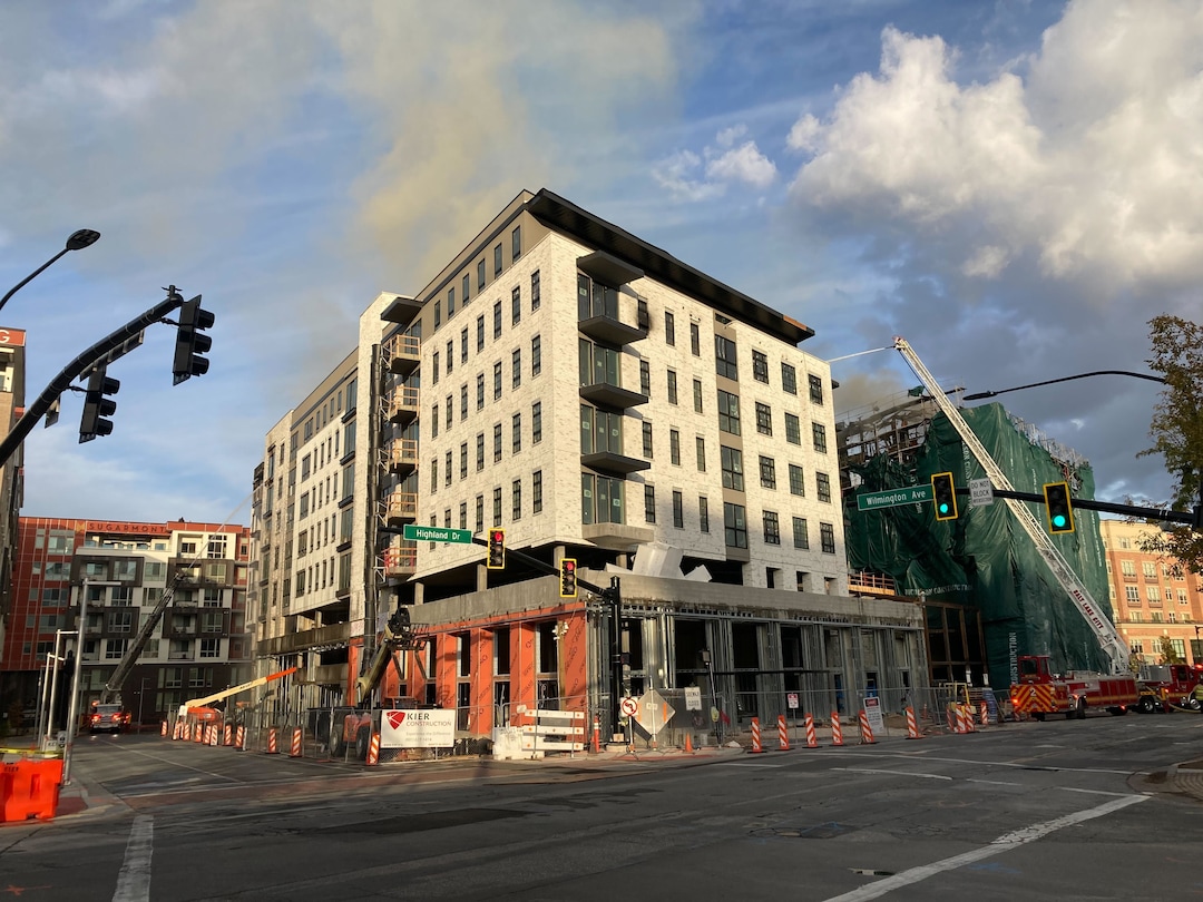 (Chris Samuels | Salt Lake Tribune) Salt Lake City fire crews respond to a massive blaze at an apparently unoccupied, under-construction building in Sugar House early Wednesday, Oct. 26, 2022.