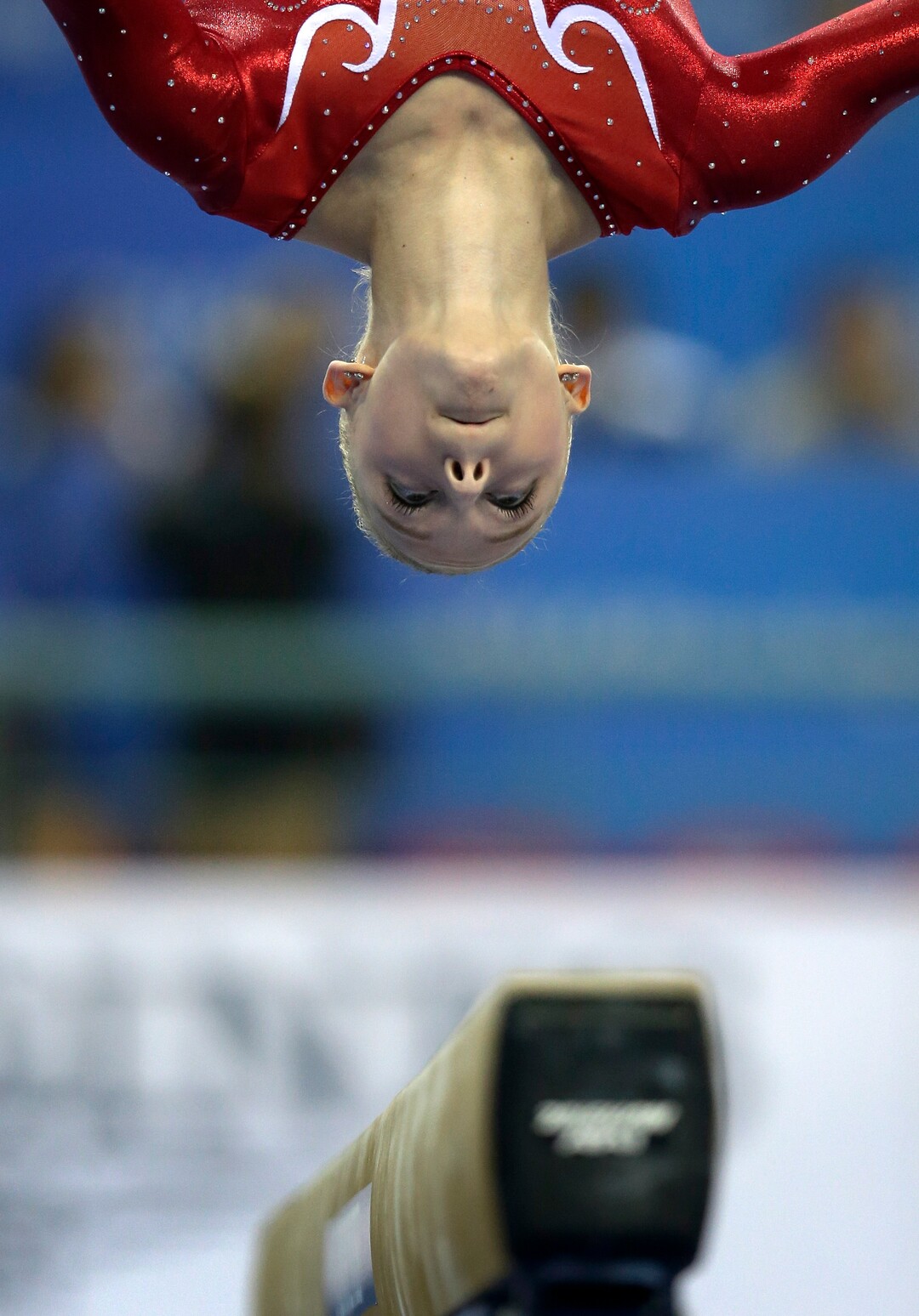 Mykayla Skinner of the United States keeps her eyes on the balance beam as she competes in the women's team final of the Artistic Gymnastics World Championship at the Guangxi Gymnasium in Nanning, capital of southwest China's Guangxi Zhuang Autonomous Region Wednesday, Oct. 8, 2014. (AP Photo/Andy Wong)