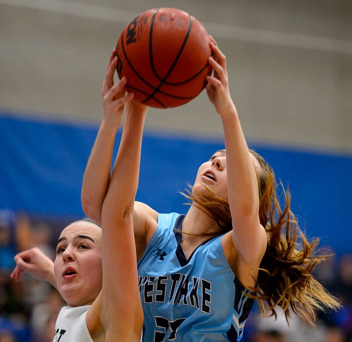 (Trent Nelson | The Salt Lake Tribune)  Hillcrest's Annabella Jensen (31) and Westlake's Rian Fullmer (22) as Hillcrest faces Westlake in the 6A High School Girls' Basketball Tournament at SLCC in Taylorsville, Thursday Feb. 22, 2018.