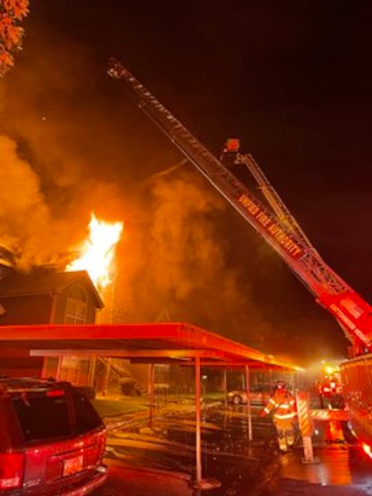 (Murray Fire Department) Firefighters battle an apartment building fire in Murray early morning Thursday, July 1, 2021.