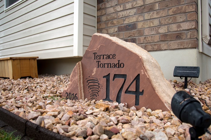 (Benjamin Zack | Standard-Examiner via AP) A new address marker sits at the spot where a tornado knocked down the east side of Gaelynn and Paul Sewell's former home in Washington Terrace, Utah.