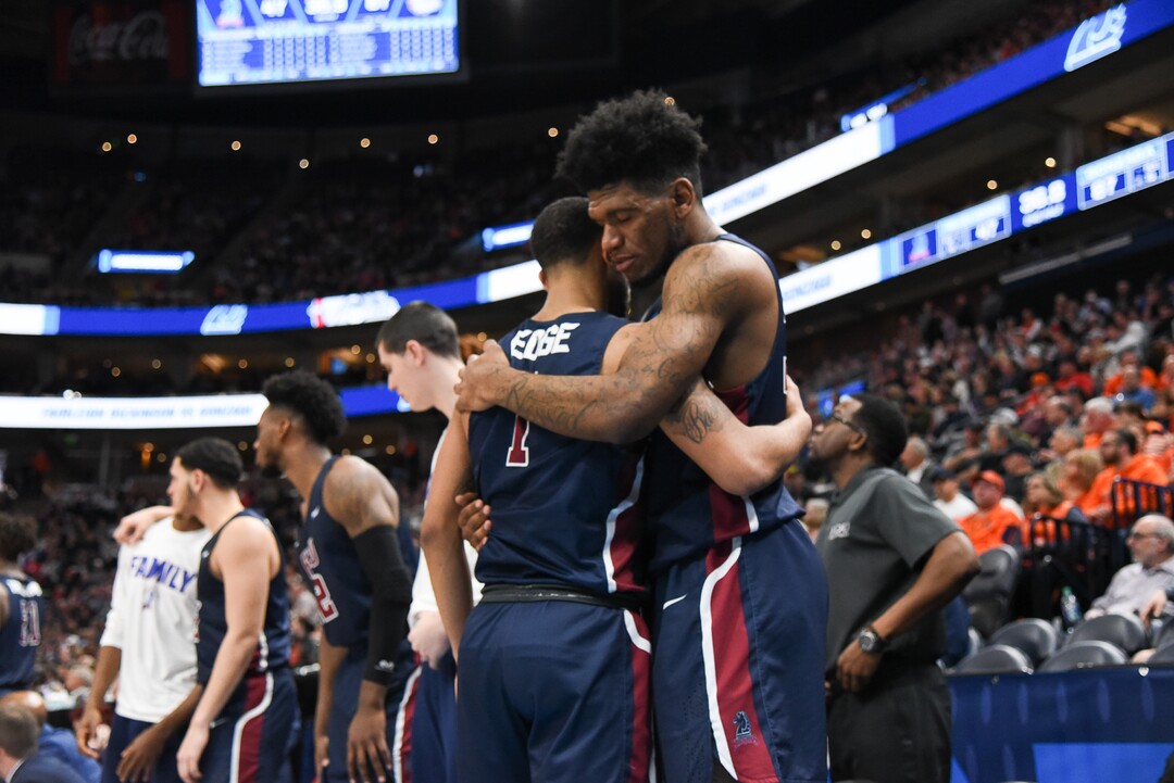 (Francisco Kjolseth  |  The Salt Lake Tribune)  Fairleigh Dickinson Knights guard Darnell Edge (1) and Fairleigh Dickinson Knights forward Mike Holloway Jr. (34) embrace as they fall to Gonzaga in their first round menÕs NCAA March Madness tournament game at Vivint Smart Home Arena in Salt Lake City on Thursday, March 21, 2019.