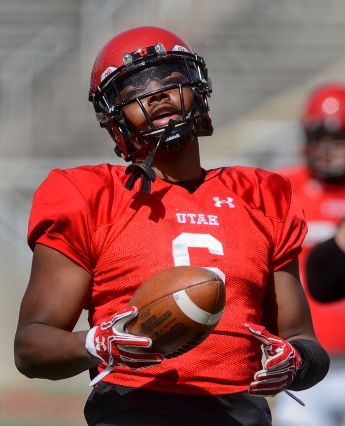 (Steve Griffin  |  The Salt Lake Tribune) Utah running back rand Shyne runs the football during the University of Utah football team's first scrimmage at Rice-Eccles Stadium in Salt Lake City Friday March 30, 2018.