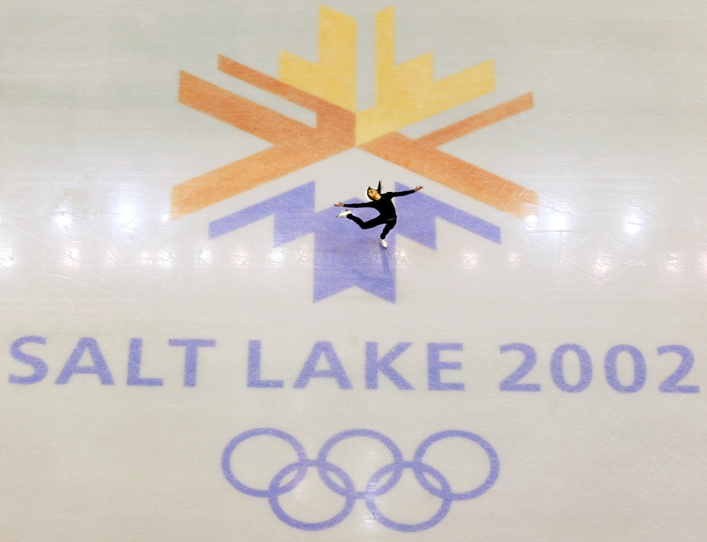 FILE - This Feb. 8, 2002 file photo shows U.S. champion Michelle Kwan practicing for the women's short program for the Winter Olympic Games at the Salt lake Ice Center in Salt Lake City. There's an outside shot the United States won't have to wait 11 years to host its next Olympics. It's a longshot, but there's talk in Salt Lake City, and even some in Denver, of a bid for the 2026 Winter Games, which take place two years before the Summer Olympics return to Los Angeles. (AP Photo/Doug Mills, file)